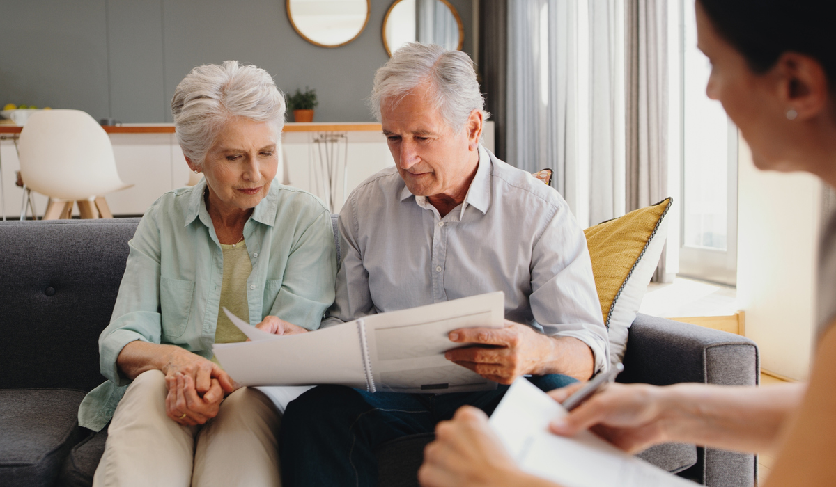 Senior couple writing a will